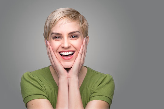 Cute laughing shocked surprised perfect smile white teeth happy with dental visit