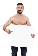 Shirtless man pointing to a blank sign