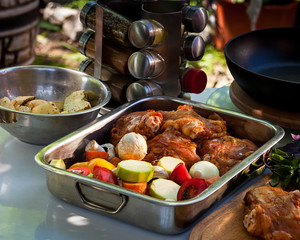 Raw meat, potatoes and vegetables