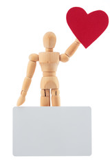 Wooden man toy statue with heart and blank card for text studio