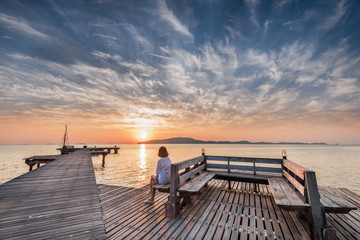 Women looking at sunset ,background twilight