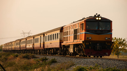 Passenger train was passing through rural field, 2015.