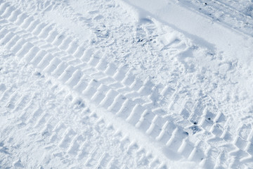 Background texture of  tire tracks on winter road