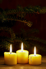 Beautiful golden candles, dark background