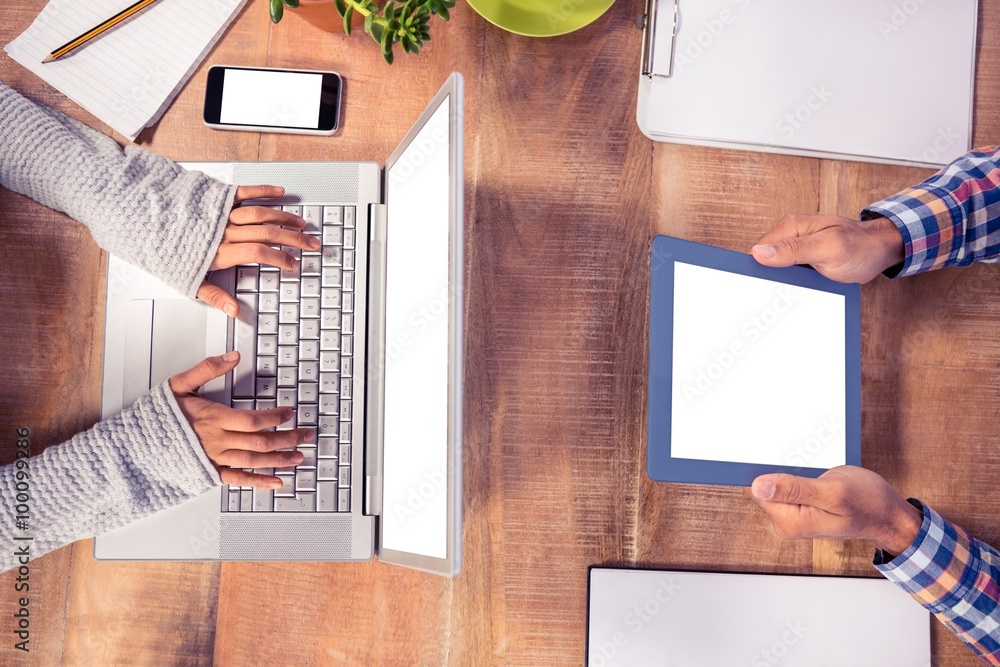 Poster overhead view of hands working at desk