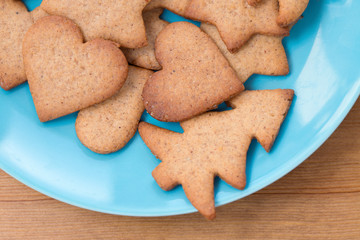 Tasty homemade cookies on blue plate