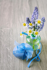 Easter arrangement with spring flowers and eggs