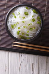 Chinese cellophane noodles in a bowl. Vertical top view
