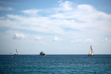 Sea vessels on seascape background