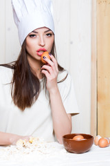 Woman cooking from eggs