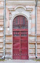 old door with wrought-iron details