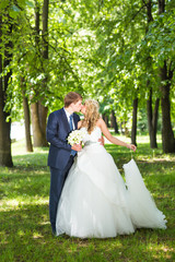 Bride and groom having a romantic moment on their wedding day