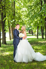 Bride and groom having a romantic moment on their wedding day