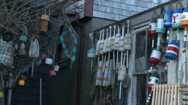 Fishing gear hanging on a weathered shack in Massachusetts.