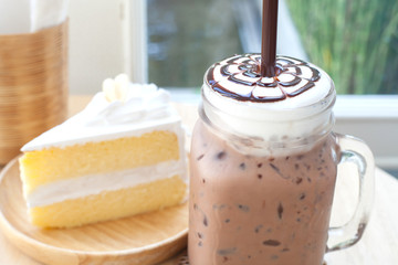 Big iced cocoa glass on wooden table
