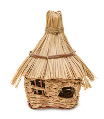 Straw house isolated on white background. Building concept.