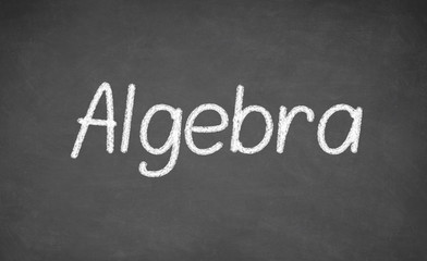 Algebra lesson on blackboard or chalkboard.