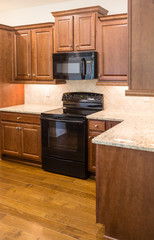 Black Appliances in New Kitchen