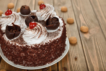 Chocolate cake with whipped cream