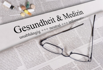 Tageszeitung mit Überschrift Gesundheit & Medizin