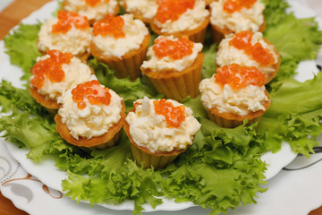 tartlets with red caviar and cheese appetizer