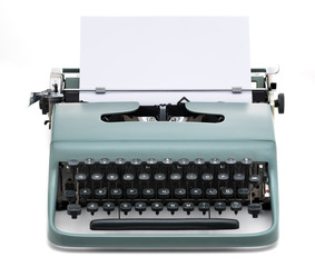 vintage typewriter with blank paper