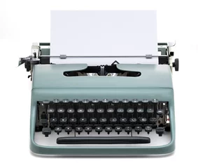 Fotobehang vintage typewriter with blank paper © MIGUEL GARCIA SAAVED