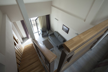 staircase in duplex apartment interior selective focus