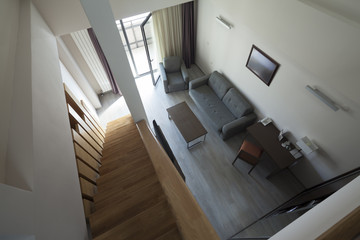 staircase in duplex apartment interior selective focus