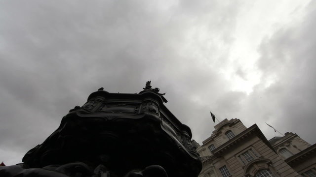 Birds Perched on the Eros statue in london