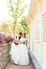 Fototapeta premium Bride and groom having a romantic moment on their wedding day.