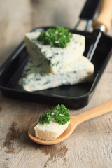 Blue cheese with parsley