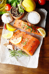 Raw salmon on baking paper