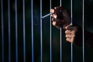 hand smoking in jail