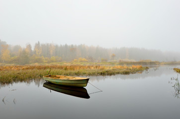 river and a boat scene during Fall season - 100114897