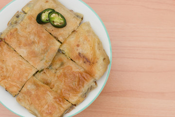 Martabak or murtabak, is a stuffed pancake is arab food.