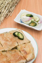 Martabak or murtabak, is a stuffed pancake is arab food.