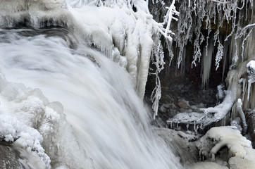 waterfall in winter with beautiful icicles