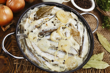 Capelin stewed in milk