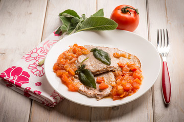 escalope with tomatoes and sage