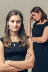Adult daughter quarrel with her mother.
