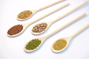 Seeds on wooden spoon
