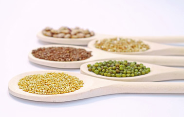 Seeds on wooden spoon