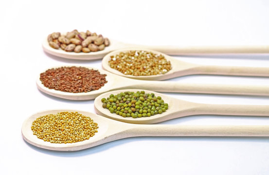 Seeds on wooden spoon
