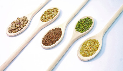 Seeds on wooden spoon