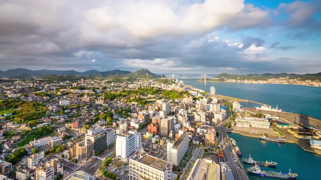 Shimonoseki, Japan city skyline time lapse over the Kanmon Straits.