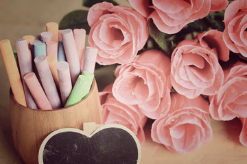 Colorful chalk with black heart