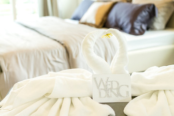Fototapeta na wymiar swan shape towel in bedroom