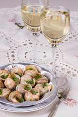White wine and grape snail