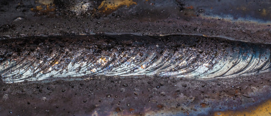 welding seam onto steel sheet metal Industrial steel welder in factory 